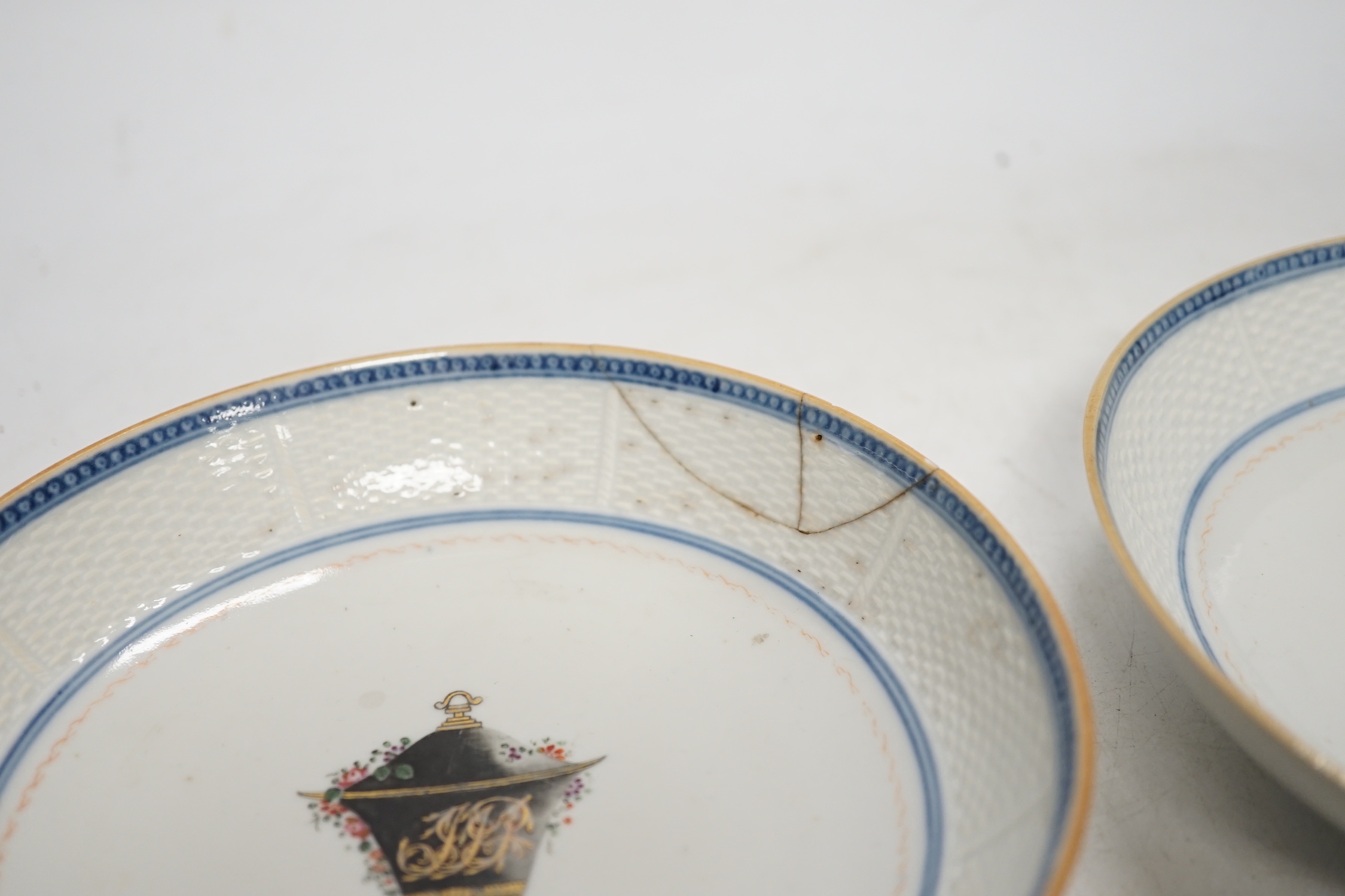 A Chinese turquoise glazed saucer dish, Qianlong Mark and period and two Chinese export famille rose saucers, Qianlong period, 16cm diameter